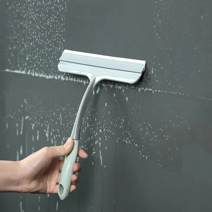 A bathroom shower squeegee for cleaning shower doors and car windows, an efficient surface cleaning tool.