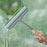 A bathroom shower squeegee for cleaning shower doors and car windows, an efficient surface cleaning tool.