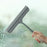 A bathroom shower squeegee for cleaning shower doors and car windows, an efficient surface cleaning tool.